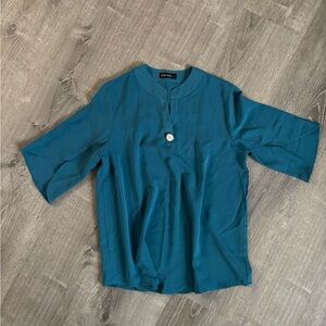 Elegant Teal Blouse by [Brand]